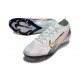 Botas Nike Mercurial Vapor 16 Elite FG MDS Casi Verde Dorado metalizado Moneda